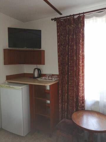 Фото номера Двухместный номер с 1 кроватью Мини-отель Guest yard Vivat г. Velikodolinskoye 7